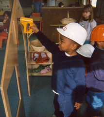 Child Building a House